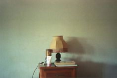 a lamp and some items on a table