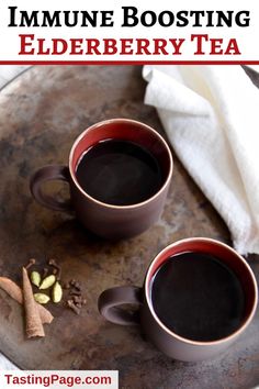 two mugs of tea with cinnamon and anise on the side