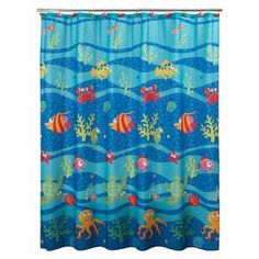 a blue shower curtain with fish and sea animals on it, in the ocean water