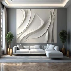 a living room with a large painting on the wall and white furniture in front of it