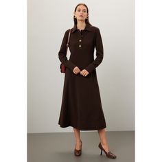 Black crepe (94% polyester, 6% elastane). A-line. Long sleeves. Collar. Front button closure. 49.2" from shoulder to hemline. Imported. Classic Shirt Dress, Favorite Boots, Rent The Runway, Closet Designs, Shirtdress, Tory Burch, A Line, Shirt Dress, Long Sleeves