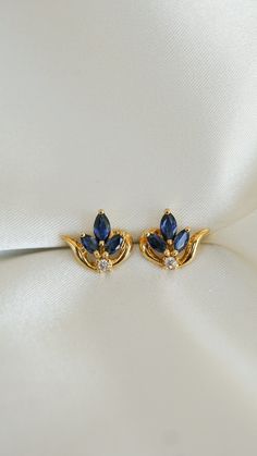 * Earring Material: Sapphire, Diamond, 18k Yellow Gold * Earring Dimensions: 0.5x0.5 Inch * Stone Weight & sizes: Sapphire - 0.95ct. Diamond -0.18ct  * Overall weight: 3.9g * Earring material: 18k yellow gold, Post Push Back Blue Stone Earrings Gold, 18ct Gold Jewellery, Sapphire Gold Jewelry, Fancy Jewelry Earrings, Gold Sapphire Earrings, Felix Jewelry, Saphire Jewelry, Sapphire Earrings Gold, Diy Earrings Studs