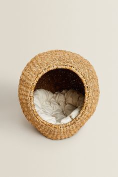 a cat bed made out of woven material