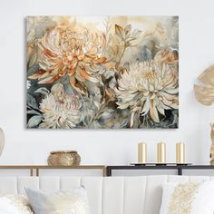 a living room scene with focus on the couch and large floral painting hanging above it