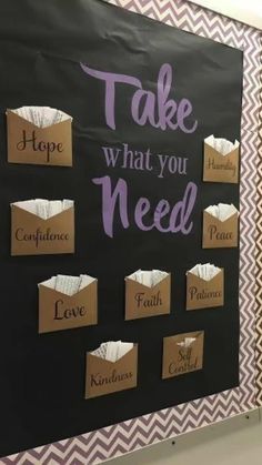 a bulletin board that says, take what you need and some other things on it