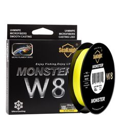 a spoole of yellow fishing line next to the packaging for monster w8