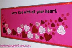 valentine's day bulletin board with hearts and words on pink background, love god with all your heart