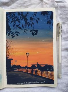 an open book with a painting of a person walking on a bridge at sunset in the background