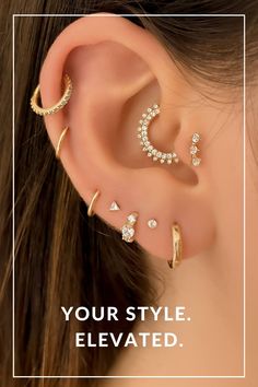 an ear with three different types of piercings on it and the words you're style