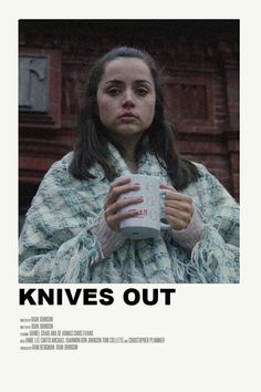 a woman holding a coffee cup in her hands with the words knives out on it