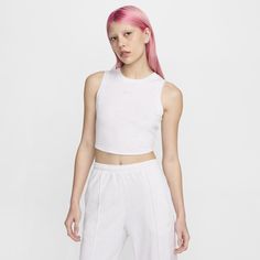 Grounded in style, comfort and versatility, meet our new luxury loungewear. With a cropped fit that hits near the waist, this tank is made from our soft mini-ribbed jersey is stretchy with a slight drape, making it perfect for everyday wear. So wear it around the clock and all through the calendar. Spring Athleisure Crop Tank Top, Spring Athleisure Crop Top Tank, Nike Stretch Athleisure Crop Top, Fitted Cotton Activewear For Leisure, Nike Athleisure Crop Top For Gym, Athleisure Tank Crop Top For Loungewear, Sporty Tank Crop Top For Loungewear, Nike Stretch Crop Top For Workout, Nike Fitted Crop Top For Workout