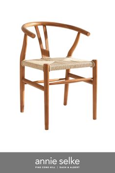 an image of a wooden chair with the words annie selke on it