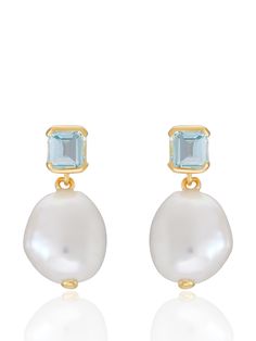 The Bella pearl earrings feature baroque pearl and step cut 'something blue' topaz, a staple in V jewellery and a nod to our Art Deco inspiration. The perfect bridal earrings that re-imagine classic vintage designs through a contemporary lens and can be worn effortlessly on your big day and beyond Made from 18 carat gold vermeil and set with a step cut blue topaz stone and baroque pearl. Please note as these earrings contain natural baroque pearls, the shape may differ slightly to those shown in the images provided. Height: Approx. 18mm. Width: Approx 8.5mm. Material: 18ct Gold Vermeil. Stone type and amount: Baroque Pearl & Blue Topaz. Something Blue Earrings, Blue Earrings Wedding, Art Deco Inspiration, Blue Topaz Stone, Gold And Blue, Step Cut, Topaz Stone, Earrings Wedding, Something Blue