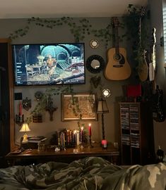 a flat screen tv mounted to the wall above a bed