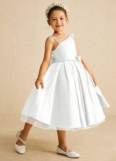 Complete your bridal party with our modern matte satin flower girl dress, Lollipop. Her one-shoulder neckline is complemented with a bow at the shoulder and bow belt. The skirt is ruched beautifully to flare as she walks down the aisle. Lollipop Flower, Tea Length Flower Girl Dress, Tea Length Tulle, Satin Flower Girl Dress, Ivory Flower Girl, Ivory Flower Girl Dresses, Tulle Flower Girl, White Flower Girl Dresses, Bow Belt