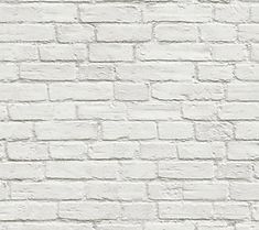 an old white brick wall textured with paint