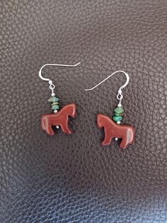 If you love horses, you need these earrings in your wardrobe. They feature stone horses, genuine Turquoise and Sterling silver ear wires. They also come with clear rubber earring backs so they stay firmly on your ears. Nickel-free Adjustable Southwestern Earrings, Southwestern Style Nickel-free Brown Earrings, Horse Earrings, Southwestern Style, Genuine Turquoise, Earring Backs, Turquoise Stone, Hippie Boho, Jewelry Earrings Dangle