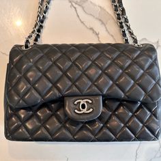 Authentic Pre-Loved Chanel Double Flap Black Bag With Leader Chain. It Had A Sticker With A Serial Number, Unfortunately, It Is Not There Anymore, But It Dated 2010. It Has Been Worn, But Really Good Condition. Photos Are Not Filtered And I Did Not Polish The Bag On Purpose So The Pictures Can Be As Close As Possible. Please Make Decent Offers, I Will Be Open. No Crazy Low Offers Pls. Thank You All Chanel Double Flap Bag, Chanel Jumbo Flap, Vintage Chanel Flap Bag, Chanel Vintage Jumbo Flap, Chanel Double Flap, Chanel $95.00 Bag, Black Bag, Baddie Hairstyles, Chanel Bag