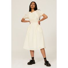 Cream cotton (100% Cotton). Hourglass. Crew neck. Short sleeves. Tie closure. 45.5" from shoulder to hemline. Imported. Cotton A-line Midi Dress With Relaxed Fit, White Cotton Dress With Gathered Sleeves, White Cotton Dresses With Gathered Sleeves, Spring Cotton Midi Dress, White Relaxed Fit Dress With Puff Sleeves, Cream Cotton Short Sleeve Dress, Cream Cotton Dress With Short Sleeves, White Cotton Puff Sleeve Dress With Gathered Sleeves, Cream A-line Cotton Dress