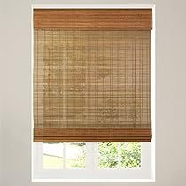 the blinds are made from bamboo and have been pulled down to match the window in the room