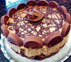 a cake with chocolate and peanut butter on top