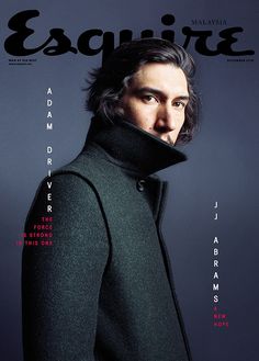 a man with long hair wearing a coat on the cover of esquire magazine