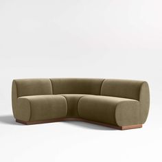 the curved couch is made out of fabric