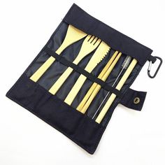 a set of utensils in a black pouch