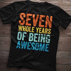 a black t - shirt with the words four whole years of being awesome on it