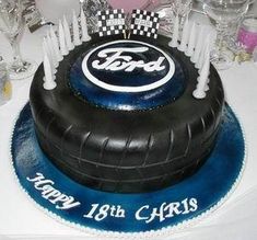 a birthday cake with the ford logo on it