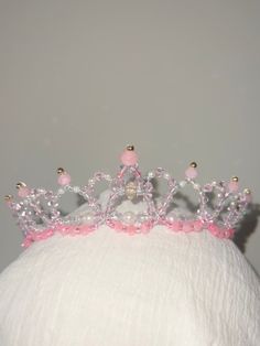 This is a beautiful Tiara headpiece that would look best with any soft or gentle variation.  (It can be use for any though of course 😊).  Hand made with lots of love and care. Details: - supplies: ($30) - time to get the right supplies and set them up right: 2 hr ($14) - time to make the tiara: 4 hr ($28) (not accounting for time to ship, cost of shipping materials.  ALSO charging $7 an hour- HALF of minimum wage) Plastic Tiara, Pink Princess Tiara, Barbie Tiara Crowns, Barbie Swan Lake Tiara, Barbie Swan Lake Crown, Ballet Tiaras, Tiara Headpieces, Beautiful Tiaras, Fairy Dolls