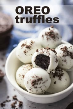 oreo truffles in a white bowl with chocolate chips on the side and text overlay