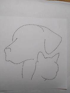 a drawing of a bear is shown in the middle of a piece of white paper