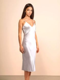 The moment you slip into this light and flowy dress you'll feel like the Goddess you are. Designed to be worn in and out of your home. Midi length and side slit for ease of movement. Pairs perfectly with our Aphrodite Silk Robe. 100% Mulberry Silk 19 momme (5A) 3-way Adjustable Straps (Criss-cross, Spaghetti, Low back) White Silk Slip Dress, Silk Loungewear, White Silk Dress, White Slip Dress, Silk Robe, Silk Slip Dress, White Bridal, Wedding Dreams, Silk Slip