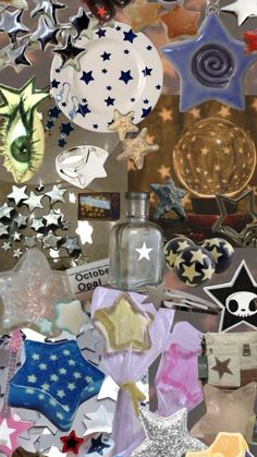 a collage of different colored and shaped objects with stars on the wall behind them