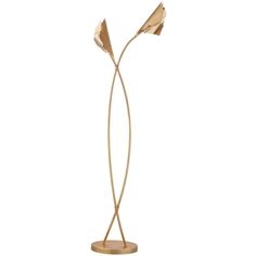 a gold floor lamp with two flowers on it