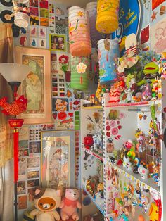 a room filled with lots of different types of toys and decorations on the wall next to each other