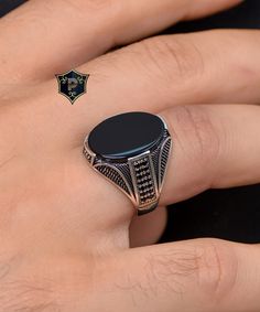 Handmade Turkish Silver Ring, Men's Black Onyx Silver Ring, 925 Sterling Silver Ring, Classic Ring, birthday gift, dad gift ✦ Details ✦ * Material: 925 Sterling Silver * Gemstone: Onyx * Weight: 8.00 grams * The size of the stone: 15x20 mm. * Sides oxidized, decorated with Garnet stones and Micro Zircon stones. * Stamp: 925 * Available sizes; 5 US to 16 US. Contact me if you need any other size! ✦ Shipping ✦ * Processing time: 1-3 business days. * This item ships from my Turkish workshop in Ista Black Sterling Silver Jewelry For Father's Day, Black Signet Ring With Polished Finish Gift, Black Sterling Silver Signet Ring For Gift, Father's Day Black Engraved Jewelry, Elegant Black Jewelry For Father's Day, Onyx Silver Ring, Mens Ring Designs, Garnet Stone, Classic Ring