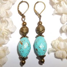 You Are Going To Love Wearing This Bohemian Style Beaded Earrings Set. Brand New & Handmade By Me - Wvluckygirl. Done With Rustic Antiqued Brown Bronze Toned Costume Jewelry Beads. They Also Have Faceted Turquoise Blue Acrylic Beads With Gold Splatters. The Pair Dangle & Drop From Lever Backs For Women's Pierced Ears. Measure 1 1/4 Inches Tall & Just Over 3/8 Inch Wide. Each Single Earring Weighs 3.6 Grams. Very Versatile Set. Could Be Worn Fancy Dressing Up Or Dress Down Business Casual. The Pe Chip Bead Jewelry, Mauve Earrings, Blue Pearl Earrings, Celtic Knot Jewelry, Animal Print Earrings, Chevron Earrings, Paired Jewelry, Unisex Earrings, Fancy Dress Up