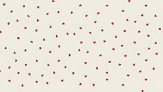 small red hearts are scattered on a white background