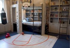 a basketball court in the middle of a bedroom with built - in bookshelves