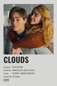 two people standing next to each other in front of a poster with the words clouds on it