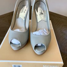 Michael Kors Grey Heels In Good Condition Size 8m Michael Kors 4-inch Heel Synthetic Heels, Michael Kors Formal Heels With Branded Insole, Formal Michael Kors Heels With Branded Insole, Michael Kors Platform Heels For Spring, Chic Michael Kors Almond Toe Heels, Michael Kors Synthetic Heels With 4-inch Heel, Michael Kors Open Toe Heels For Formal Occasions, Michael Kors Elegant Synthetic Heels, Michael Kors Formal Heels With Round Toe