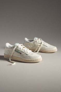 Leather upper Textile insole Rubber sole Tie styling Imported | Club C 85 Vintage Sneakers by Reebok in White, Women's, Size: 6, Leather/Rubber at Anthropologie Reebok Club C 85 Outfit Women, Reebok Club C 85 Outfit, Club C 85 Outfit, Walking Sneakers For Women, Reebok Club C 85 Vintage, Tie Styling, Club C 85 Vintage, Reebok Club C 85, Sneakers Street