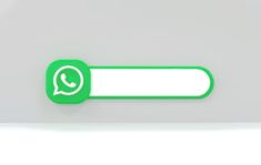 a green and white button on a gray wall with the message whatsapp?