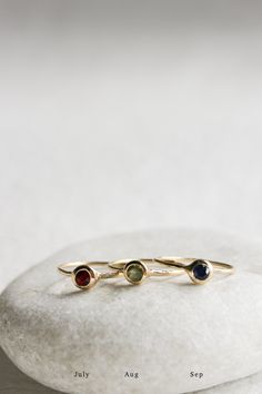 The bezel set birthstone ring is the perfect piece to celebrate those you love or yourself... or both! Add rings to stack as your family grows or incorporate your bestie or your extended family. This ring is very versatile and meaningful. Celebrate your loved ones everyday by keeping them close every day! Style this ring with another JP BIRTHSTONE RING for a fun colorful stack or create a modern look with the JP KNIFE EDGE BAND. PLEASE NOTE THE BIRTHSTONE SELECTION [CHOOSE DIAMOND OPTION FOR APR Icon Jewelry, Ring Stack, Extended Family, Bag Icon, Swiss Blue Topaz, Ruby Ring, Baguette Diamond, Birthstone Ring, 14kt Gold