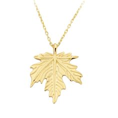 A 14K gold maple leaf necklace with a Canadian maple pendant is a beautiful tribute to nature's beauty, capturing the essence of the Canadian wilderness with its delicate floral design. It's a perfect gift for Mother's Day or a birthday, symbolizing the enduring bond between loved ones and the beauty of life's seasons. Its timeless design is sure to be cherished, reminding the wearer of the natural wonders that surround us. Product Features: * Made to Order: Crafted specifically to your preferen Maple Jewelry, Maple Leaf Bracelet, Leaf-shaped Yellow Gold Necklace For Gift, Leaf-shaped Yellow Gold Necklace, Autum Leaf Necklace, Maple Leaf Pendant, Gold Leaf-shaped Nature-inspired Necklace, Oak Leaf Necklace, Winter Necklace