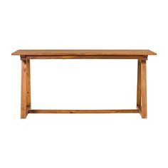 a wooden table sitting on top of a white wall