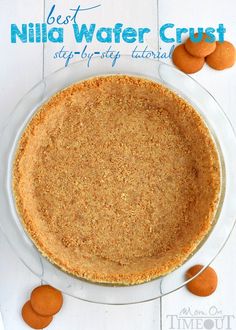 a close up of a pie on a plate with oranges around it and the words best nild wafer crust