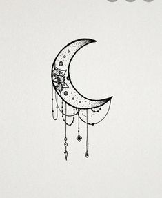 a drawing of a crescent moon with stars and beads hanging from it's side